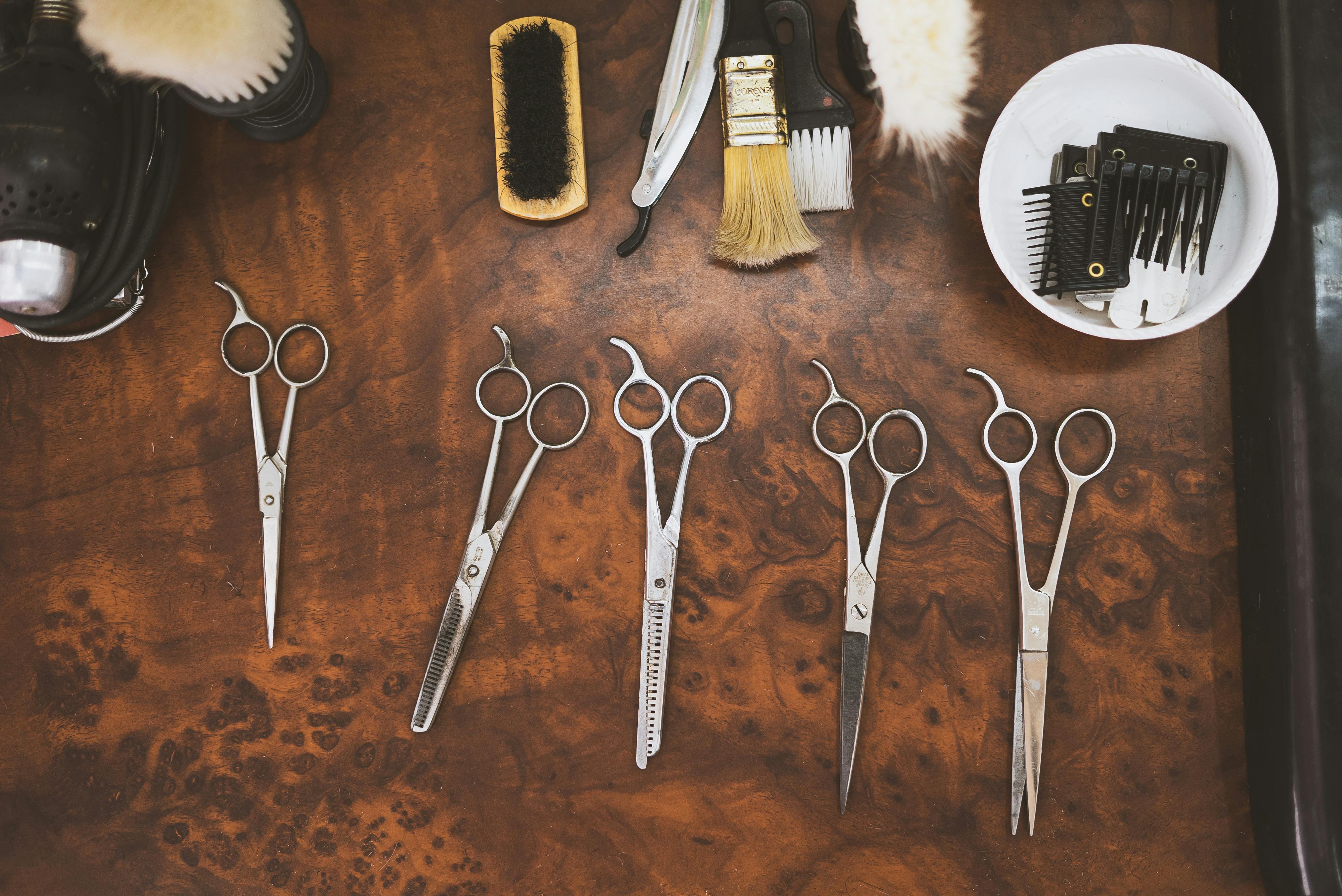 Barber scissors on dark surface